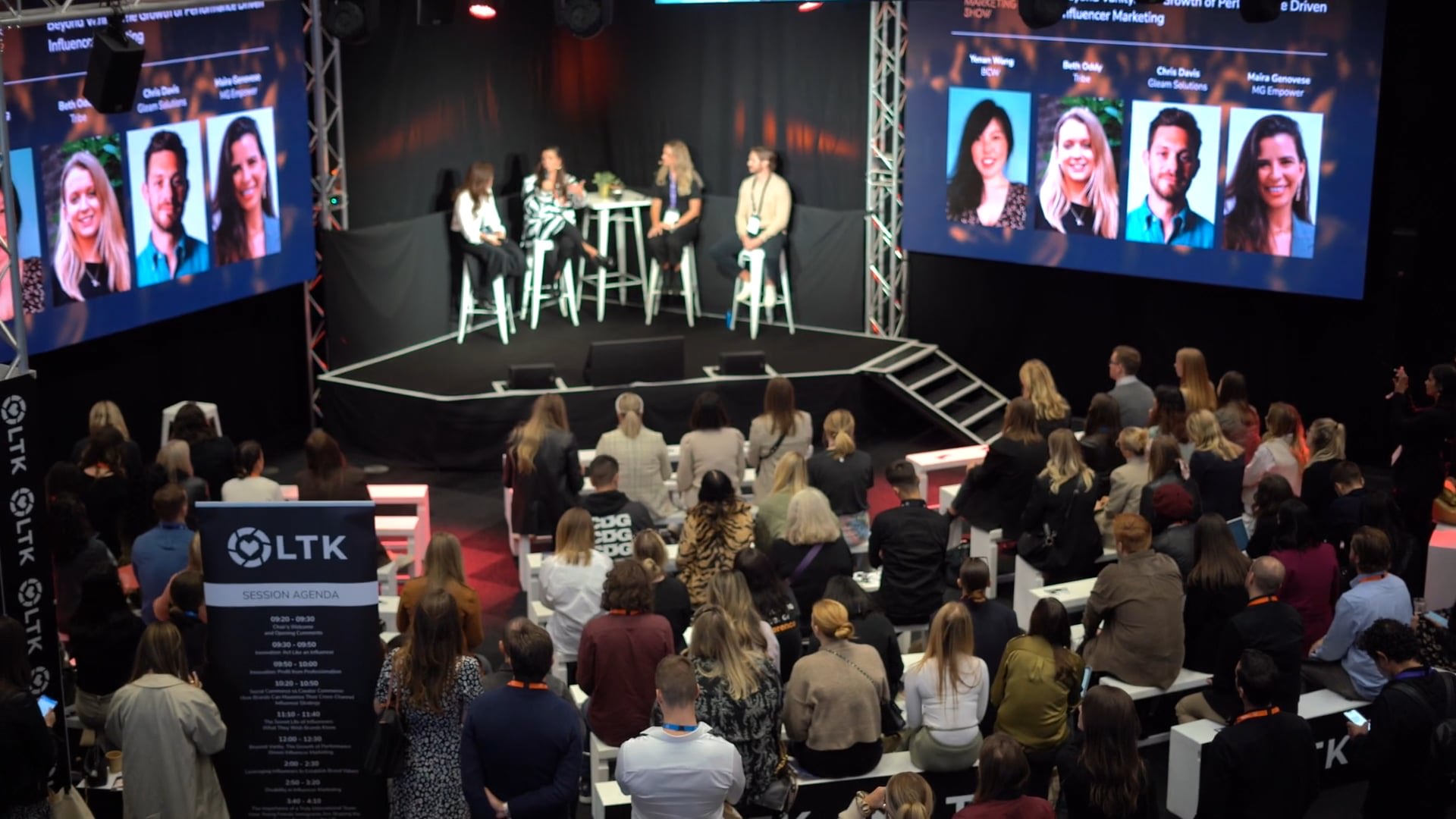 Influencer Marketing Show panel with on-screen speaker portraits